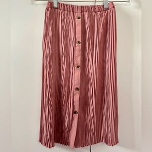 Rose colored pleated midi girls skirt